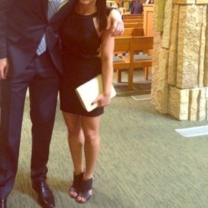 Tobi’s medium black dress with cutouts on sides.